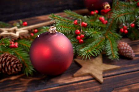 Christmas decoration with ball and fir branchesの写真素材