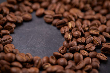 coffee beans on the wooden backgroundの写真素材