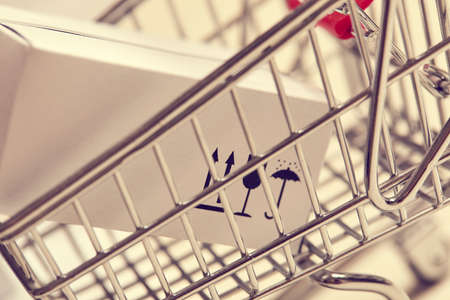 shopping trolley with boxesの写真素材