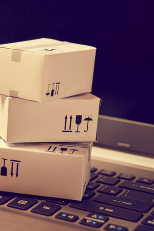delivery packaging boxes on notebook