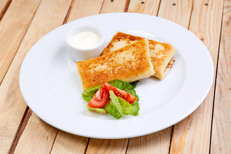 stuffed pancakes with sour creamの写真素材