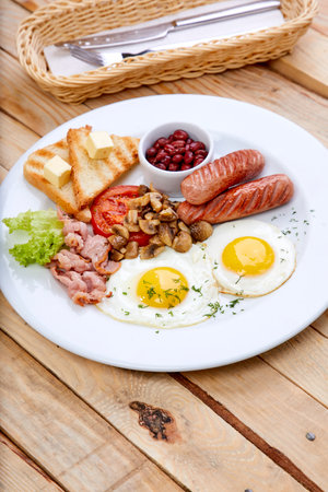 breakfast in the cafe on wooden backgroundの写真素材