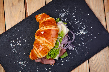 croissant with bacon and cheeseの写真素材