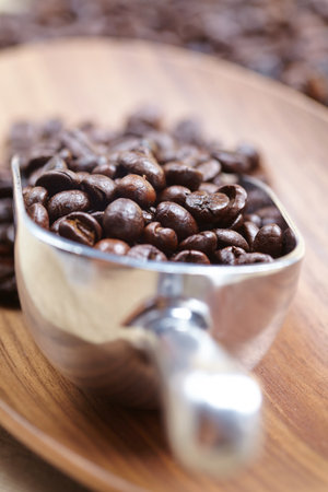 coffee beans in the spoonの写真素材
