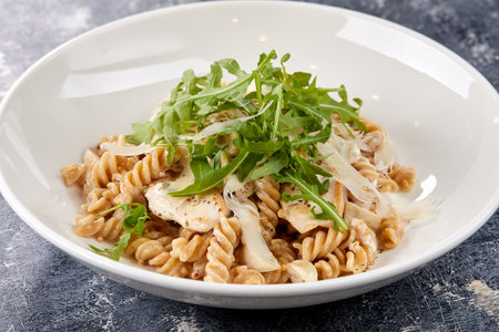 pasta with cheese and arugulaの写真素材