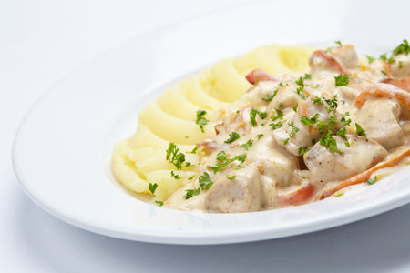 mashed potatoes with meat and sauceの写真素材