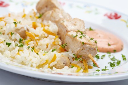 rice with chicken kebabの写真素材