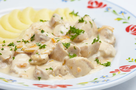 mashed potatoes with meat and sauceの写真素材