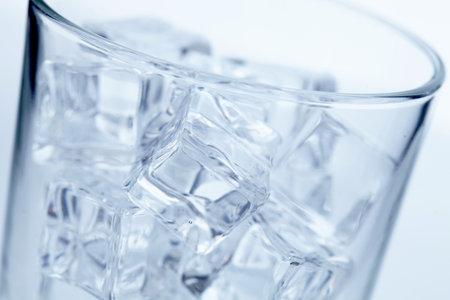 glass with ice cubesの写真素材
