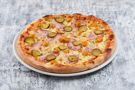 Italian pizza on the white plateの写真素材