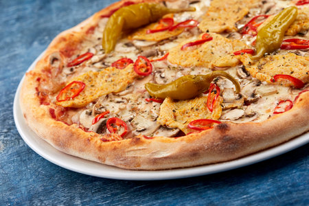 Italian pizza on the white plateの写真素材