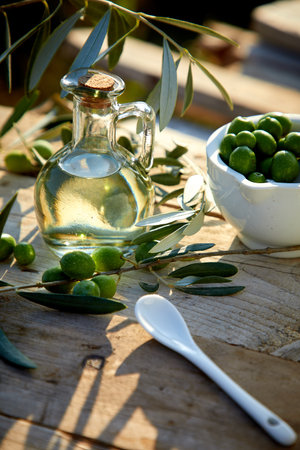 olive oil and olive branchの写真素材