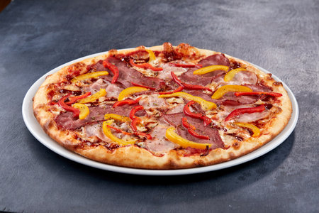 Italian pizza on the white plateの写真素材