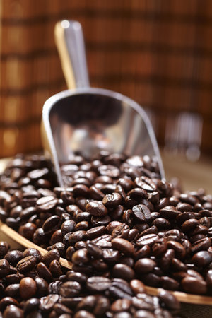 coffee beans in the spoonの写真素材