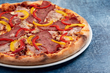 Italian pizza on the white plateの写真素材