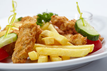 Chicken nuggets with french friesの写真素材