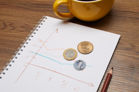 business concept - coins on the noteの写真素材