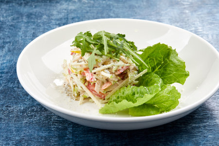 coleslaw salad on the white plateの写真素材