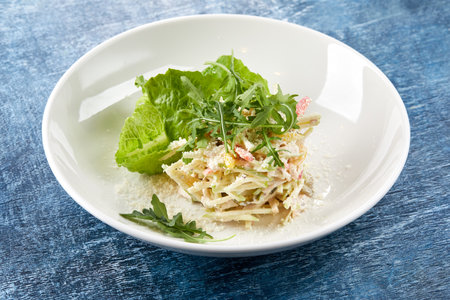 coleslaw salad on the white plateの写真素材
