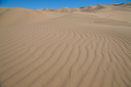 Sand dunes in the desert Gobiの写真素材