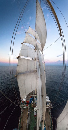 Panorama old frigate filmed the mast at sunsetの写真素材