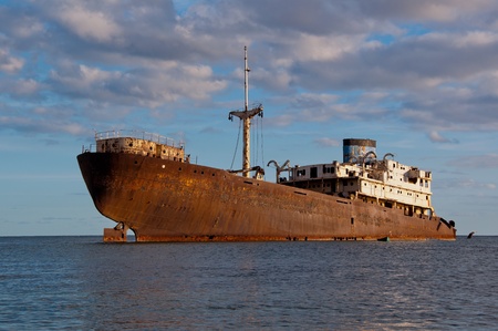 Lanzarote, Canary - October 20, 2012 Boat stranded on the coast of Lanzaroteの写真素材