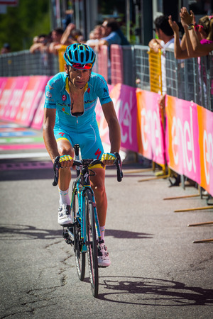Risoul, France May 27, 2016; Michele Scarponi, Team Astana, exhausted passes the finish line after a hard mountain stage with a uphill finish in Risoul, Franceのeditorial素材