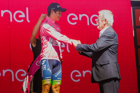 Risoul, France May 27, 2016; Esteban Chaves, Orica team on the podium after a hard mountain stages takes the pink jersey after the uphill finish in Risoul, France.のeditorial素材