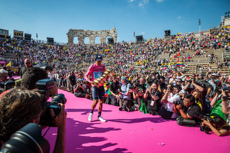 Verona, Italy June 2, 2019: Richard Carapaz, Movistar Team, in pink jersey celebrates on the stage of the Arena of Verona the victory of the Tour of Italy after 21 days of tough competitionのeditorial素材