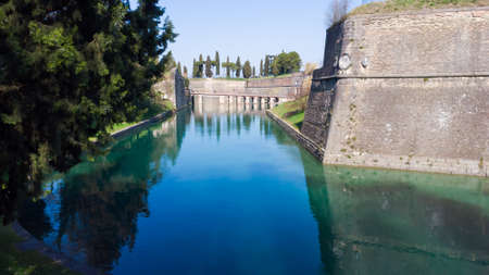 Aerial view of the ancient fortified town of Peschiera dal Garda, protected by mighty Renaissance walls and canals that surround it.の写真素材