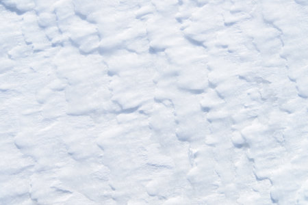 Background of fresh snow, blue shadowsの写真素材