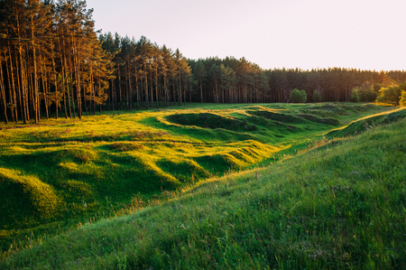 Sunset on landscape of hillsの写真素材