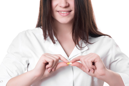 closeup doctor with pill in hospitalの写真素材