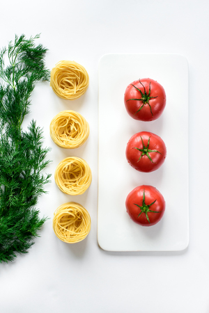 Top view on Italian pasta main ingredients isolated in white. Copy spaceの写真素材