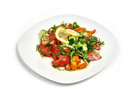 Vegetable salad. Serving dishes in a cafe, restaurant, for a menu. Isolated on white backgroundの写真素材