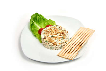 Russian traditional salad Olivier, isolated on white.