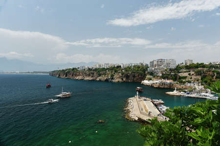 Mediterranean sea, and the coast of Antalya. Yacht Marina. Old town of Antalya is a popular Tourist destination in Turkey.の写真素材