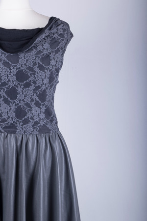 A Tailors Mannequin dressed in a Black Floral Lace Dressの写真素材