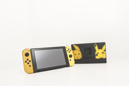 Cheshire, England - November 16th, 2018: Special Edition Pokemon Lets Go Pikachu Nintendo Switch on White Backgroundのeditorial素材
