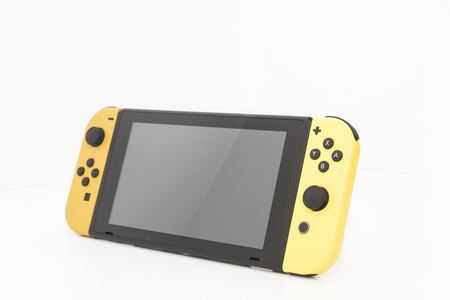 Cheshire, England - November 16th, 2018: Special Edition Pokemon Lets Go Pikachu Nintendo Switch on White Backgroundのeditorial素材