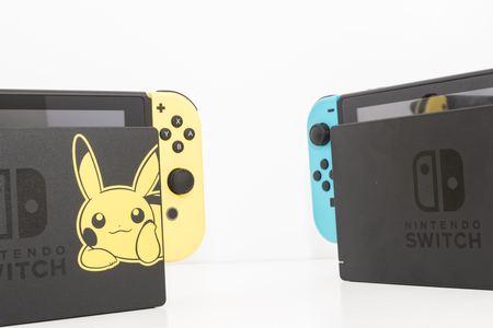 Cheshire, England - November 16th, 2018: Special Edition Pokemon Lets Go Pikachu Nintendo Switch on White Backgroundのeditorial素材