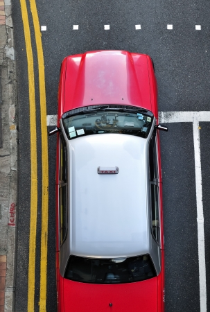 Red Hong Kong taxi from aboveのeditorial素材