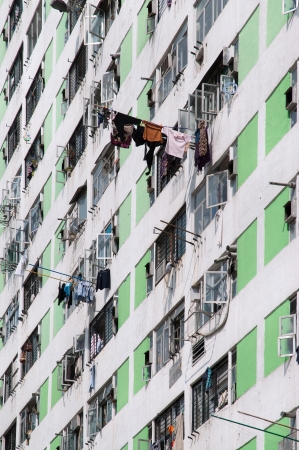 Hong Kong's public housing is characterised by high rise tower blocks located in urban estates. Here, a close-up of the Lek Yuen public housing estate in Sha Tin shows the high density living conditions familiar to many local Hong Kong residents.の写真素材
