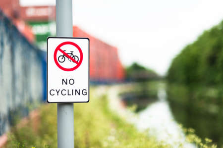 No cycling sign next to canal pathの写真素材