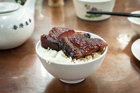 Hong Kong style barbecued pork, cha siu, served at a local dim sum restaurantの写真素材