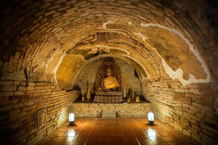 Buddha statue in one of the underground tunnels at Wat Umong, Chiang Mai, Thailandの写真素材