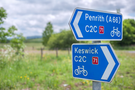 Metal signpost for the Coast to Coast route 71 of the National Cycle Network, UKの写真素材