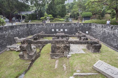 HONG KONG - OCT 9, 2013 - Foundations of the south gate of the original Kowloon Walled City at Kowloon Walled City Park, Hong Kongのeditorial素材