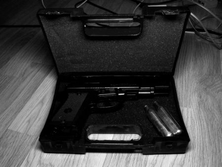 gun suitcase with gun and CO2 balloons, B/Wの写真素材