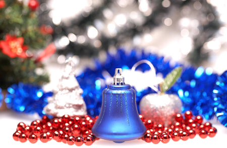 Blue bell for christmas over tinsel  の写真素材